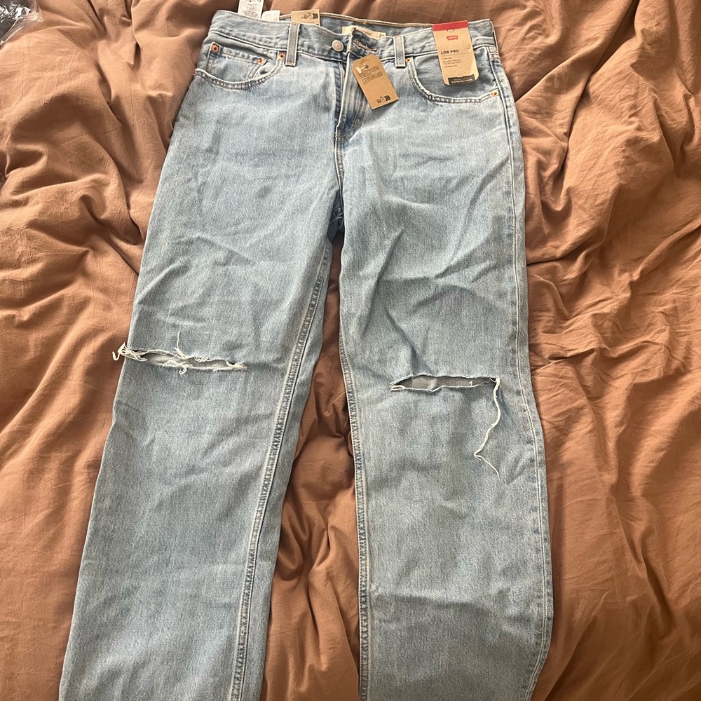 Levi's Light Blue Denim Jeans- Mid rise
